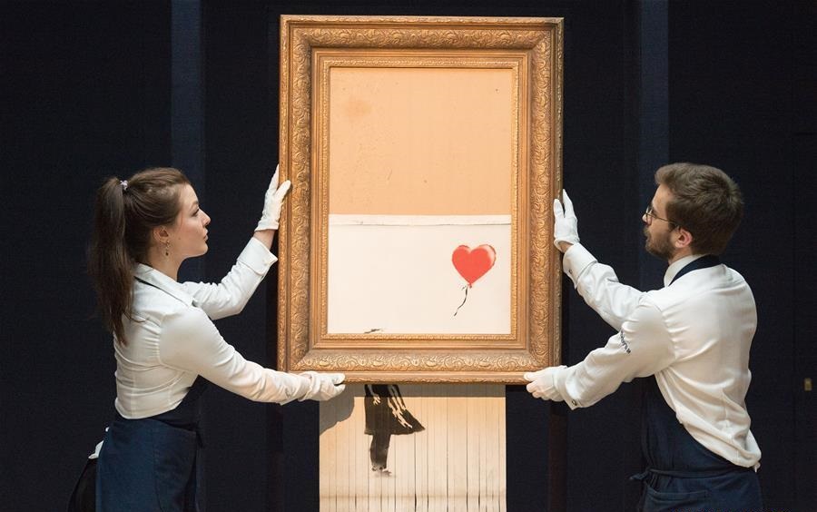 Banksy Banksy's Girl With Balloon right after self destructed in Sotherby´s auction in November 2018